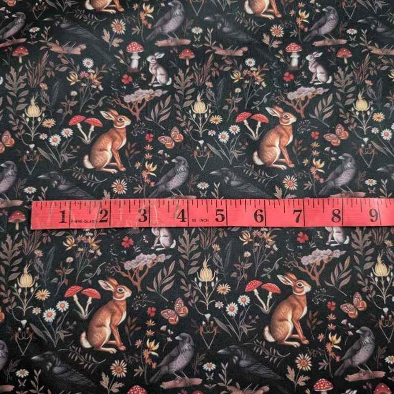 Dark forest PUL fabric with woodland animals, mushrooms, and florals – waterproof and durable material ideal for reusable bags, diapers, and outdoor gear