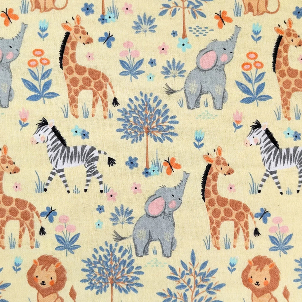 Magical Safari yellow cotton flannel fabric with elephants, giraffes, zebras, lions and floral accents.