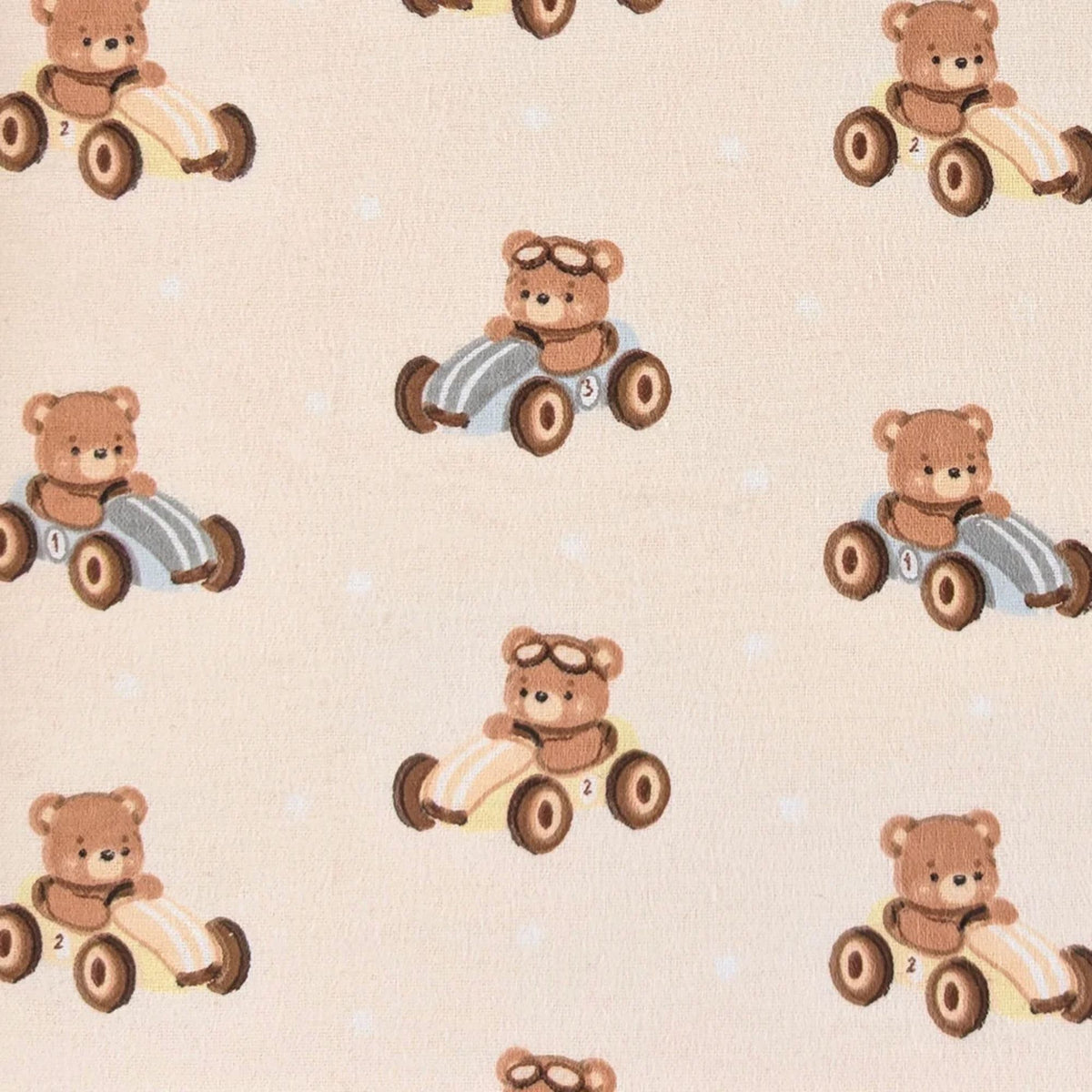 Camelot Fabrics Racing Teddies cotton flannel fabric featuring teddy bears driving vintage toy race cars on a beige background from the Fleece and Flannel 2026 Collection.