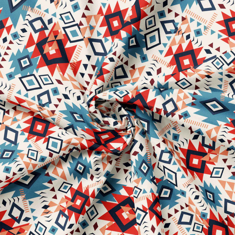 “Cream cotton fabric with colorful Southwestern Aztec geometric patterns in terracotta, blue, navy, and clay tones.”