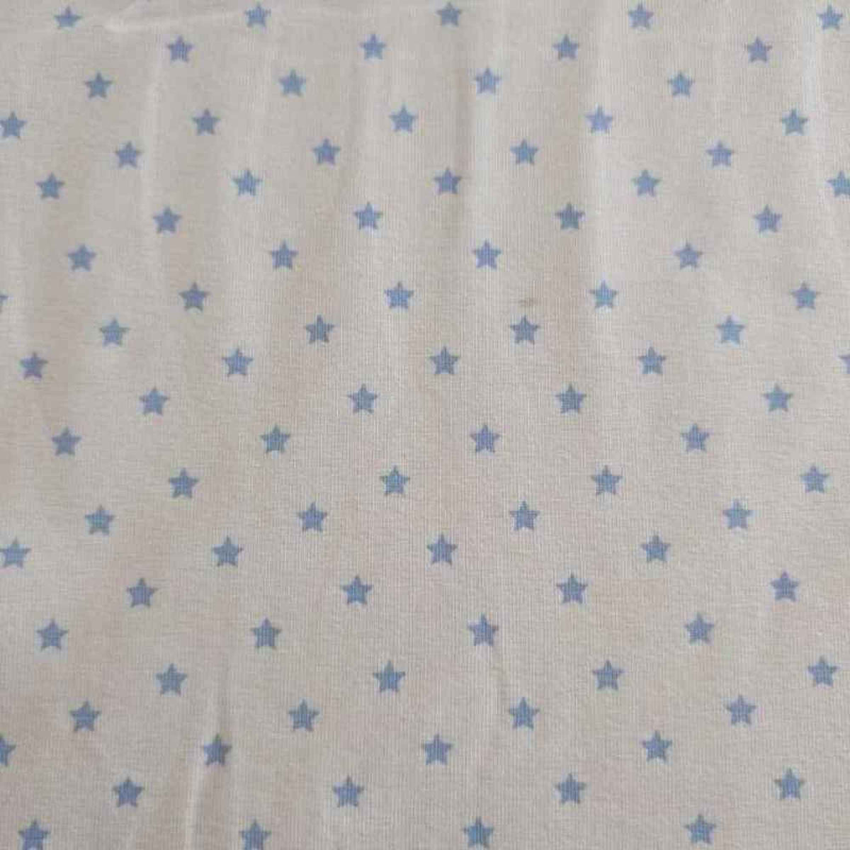 Organic cotton jersey knit fabric with Organic cotton jersey knit fabric with blue star pattern on white background