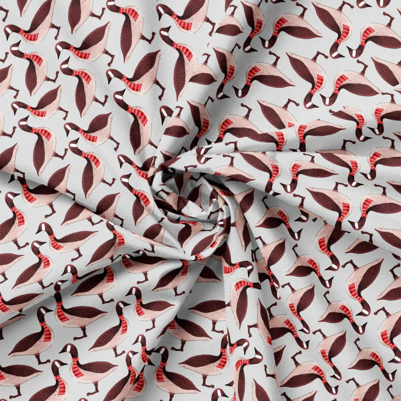 "Canadian geese on grey cotton fabric wearing red patterned scarves by Camelot Fabrics"