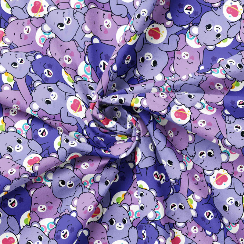 “Licensed purple Care Bears cotton fabric featuring a repeating pattern of cheerful lavender and dark purple Care Bears in cute, playful poses.”