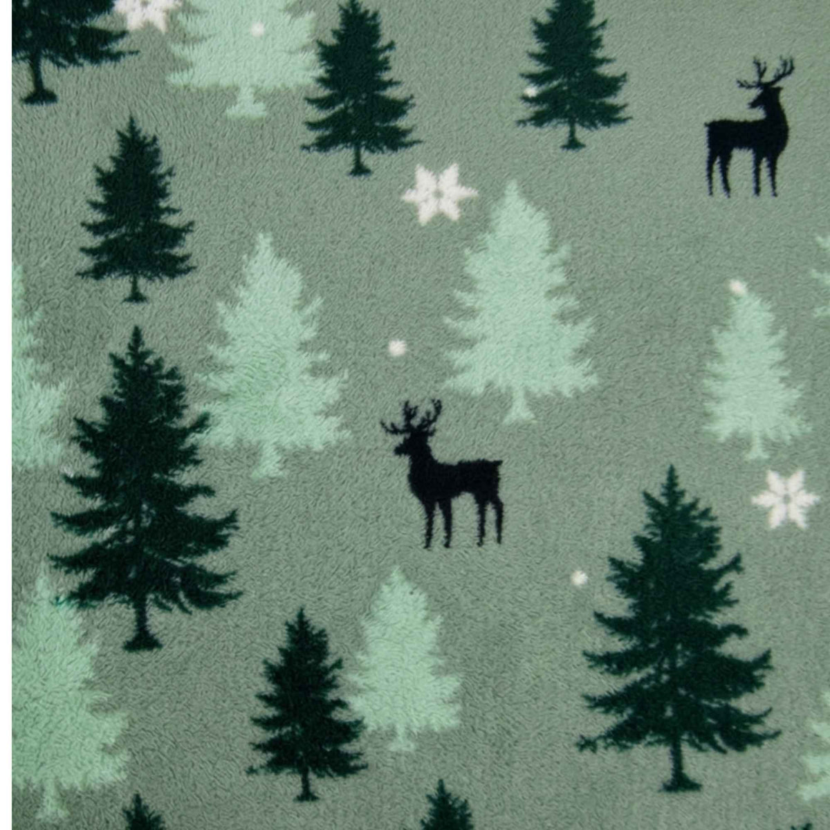 Double brushed flannel fabric featuring evergreen trees, deer silhouettes, snowflakes, and falling snow on a sage green background.