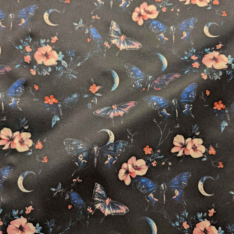 Midnight Butterfly Moon Garden exclusive waterproof PUL fabric with blue butterflies, pink flowers and crescent moons on black