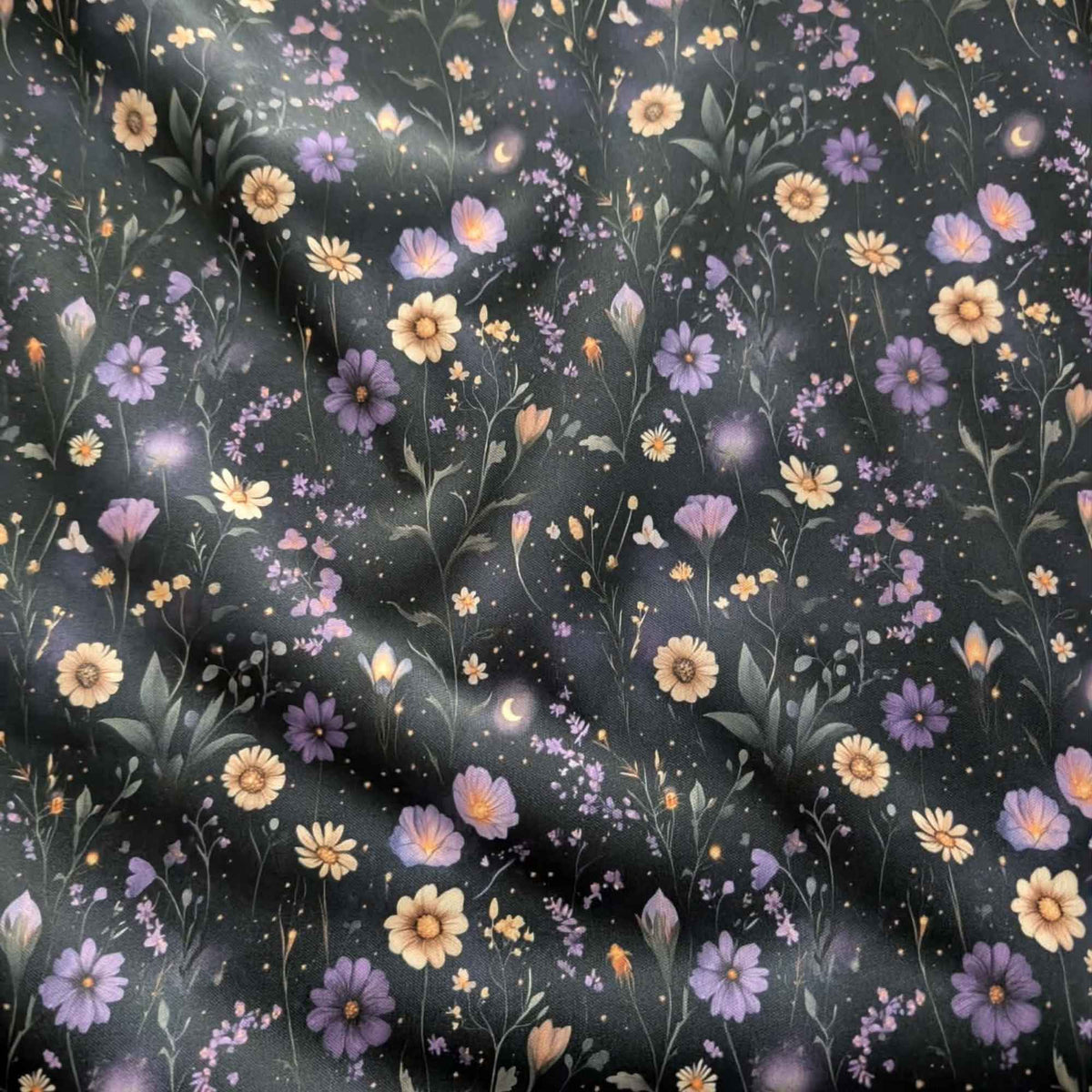 Starlit Wildflower Meadow exclusive waterproof PUL fabric with purple and golden flowers, crescent moons and glowing stars on black
