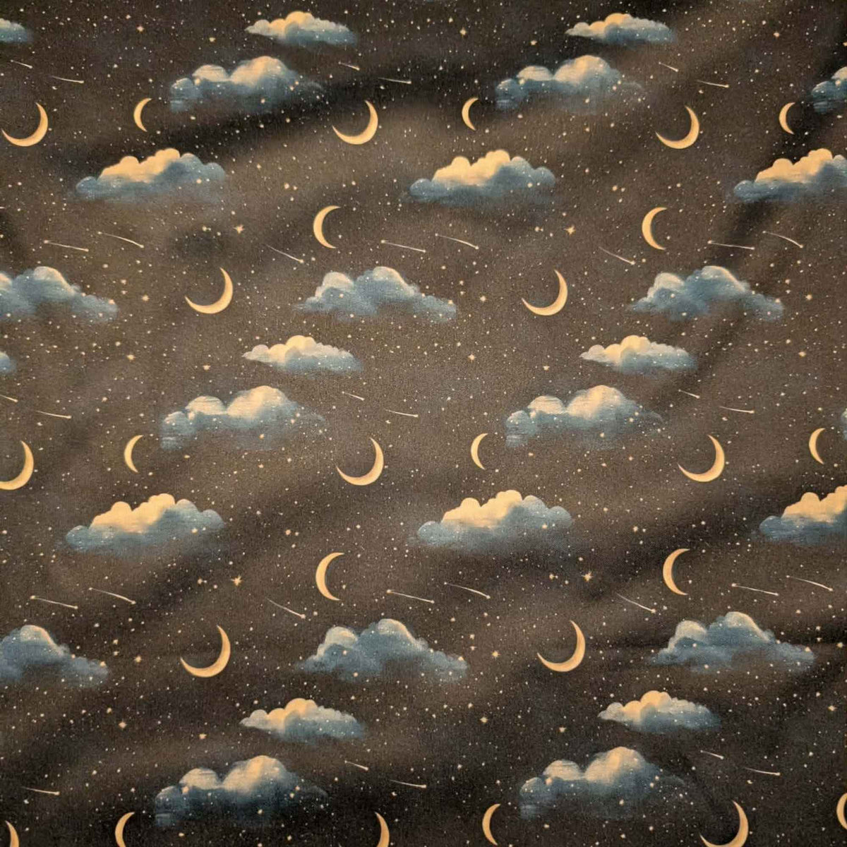 Moonlit Clouds and Shooting Stars exclusive waterproof PUL fabric with golden crescent moons, blue clouds and stars on black