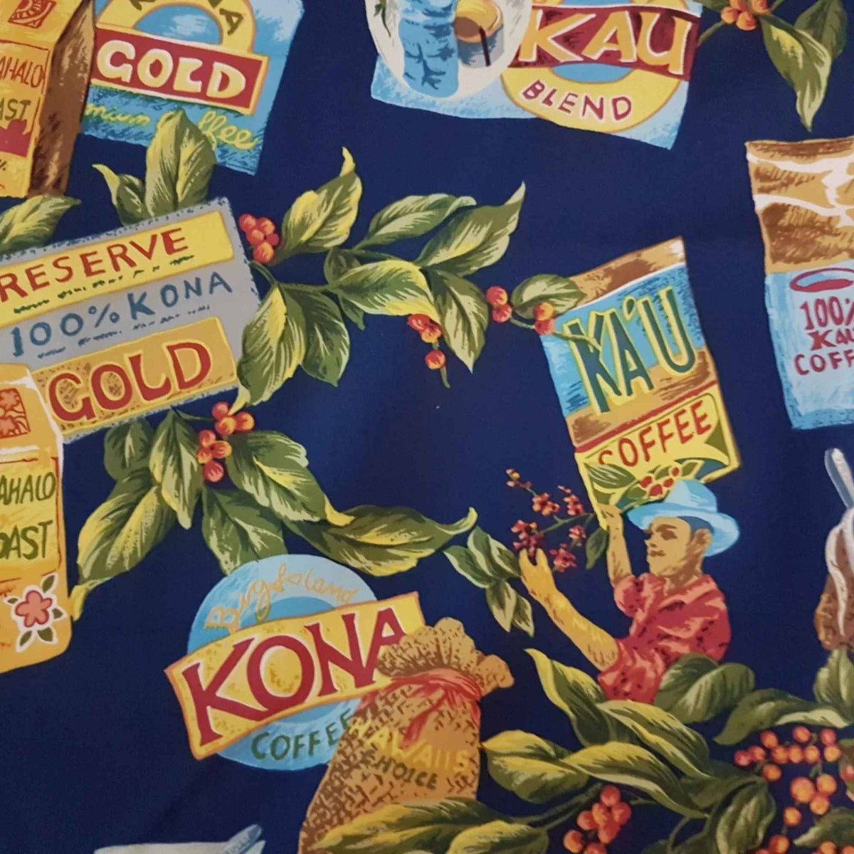 Kauai Kona Coffee Hawaiian cotton fabric featuring vintage coffee labels, coffee beans, tropical leaves and coffee cups on navy blue background