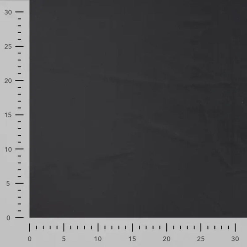 Solid black stretch jersey fabric for sportswear and swimwear – smooth, breathable, and perfect for activewear projects