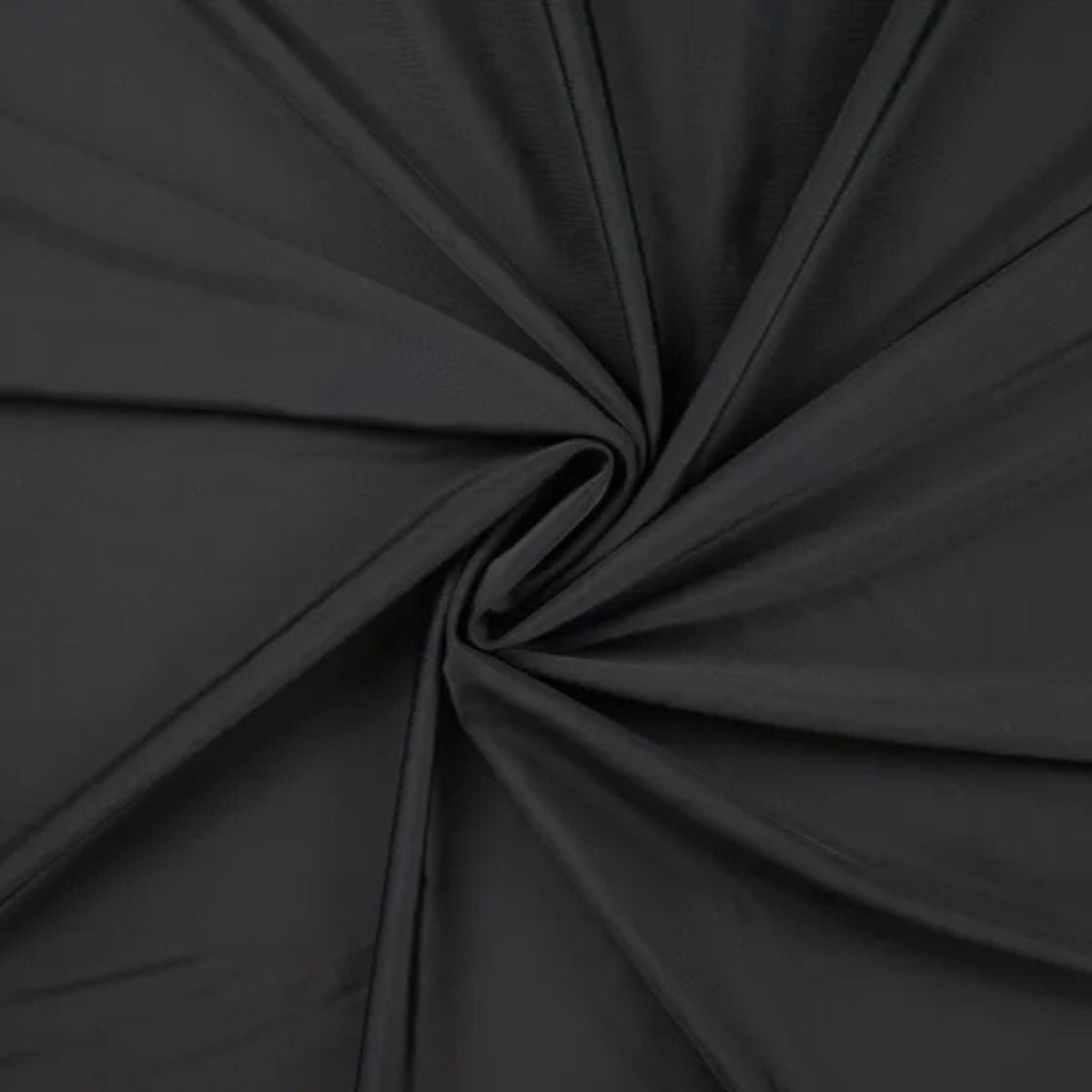 Solid black stretch jersey fabric for sportswear and swimwear – smooth, breathable, and perfect for activewear projects