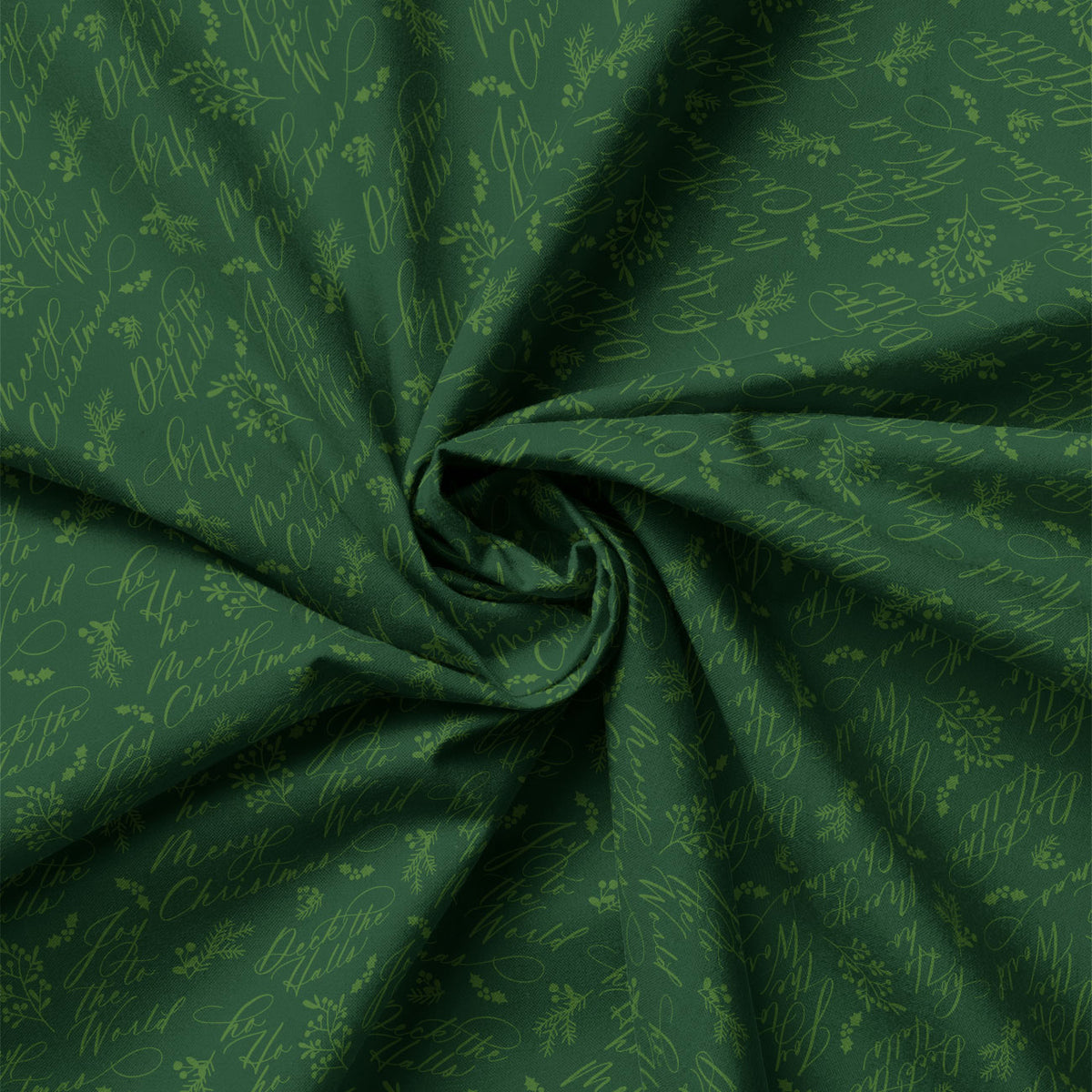 Detail view of Joy to the World Christmas Script on Green quilting cotton showing print scale and drape.