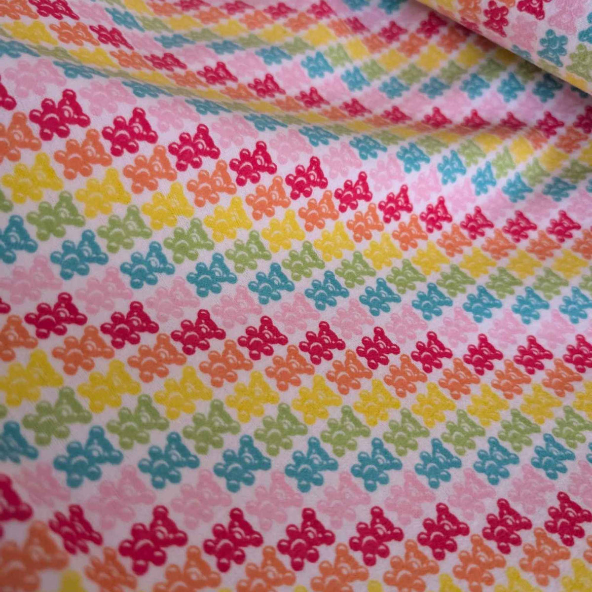 Gummy Bears Flannel Fabric – Bright Rainbow Print by Camelot Fabrics