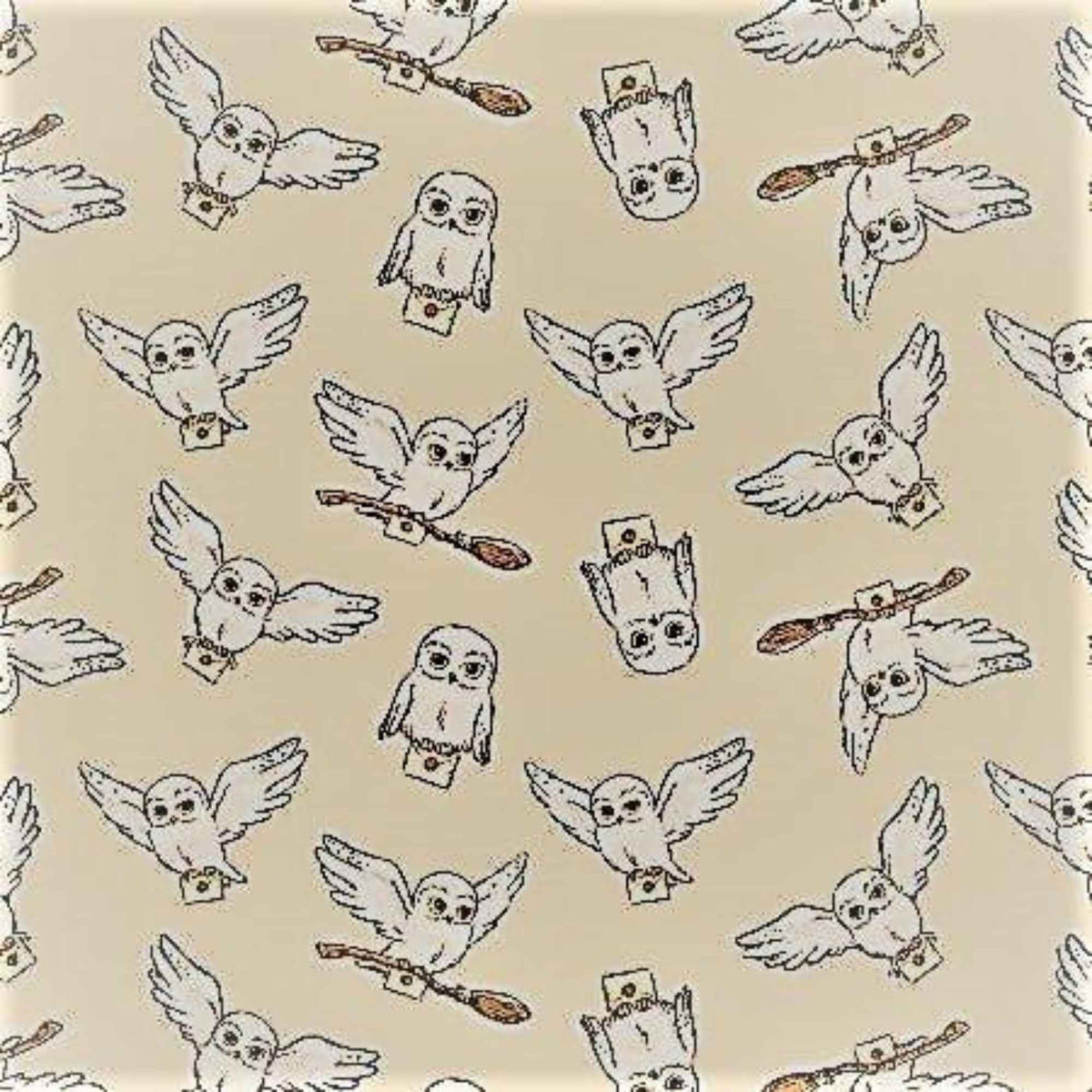 Cream cotton flannel with Hedwig the owl carrying letters, scrolls, and flying on brooms – Harry Potter Wizarding World design
