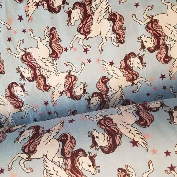 Flying Unicorn Flannel Fabric on Blue Flannel
